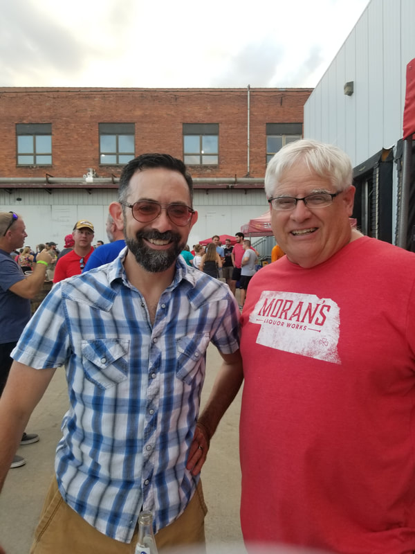 Morans Liquor Works employees at tour de brew hosted at Empyrean Brewings Warehouse